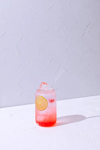 Gin Tonic Cocktail Raspbery Syrup Highball Glass Ice Cubes Lime — Zdjęcie stockowe