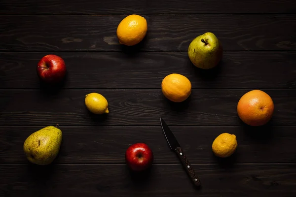 Fruits Knife Wooden Background Overhead Shot Lemon Grapefruit Apple Pear Royalty Free Stock Images