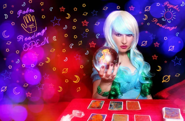 Psychic with Blond hair and Crystal Ball. Neon Lights in background — Stock Photo, Image