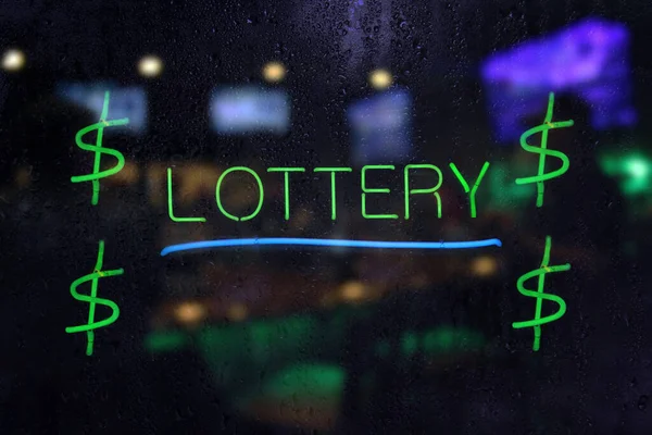 Neon Lottery Sign in Rainy Window