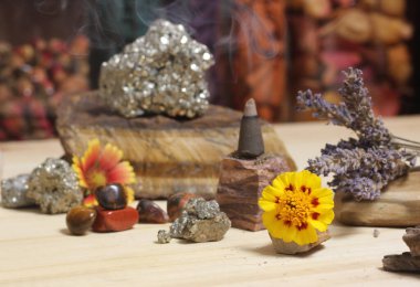 Incense Cone on Stone With Crystals and Flowers. Meditation Altar