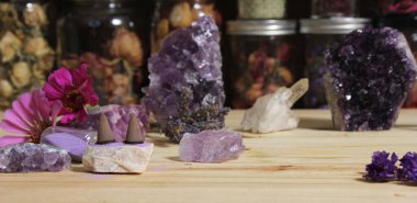 Amethyst Crystals With Flowers and Incense Cones on Meditation Altar