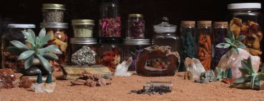Agatized Coral With Quartz Crystals and Flowers With Australian Red Sand on Meditation Altar