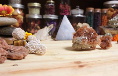 Incense Cones and Desert Rose Rocks on Meditation Table With ARagonite Crystal