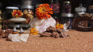 Chakra Stones on Australian Red Sand With Agatized Coral in Background Shallow DOF