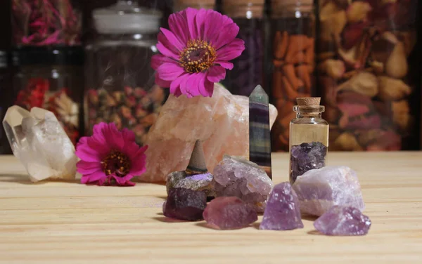 Amethyst Crystals With Flowers and Incense Cone on Meditation Altar