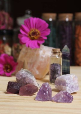 Amethyst Crystals With Flowers and Incense Cones on Meditation Altar