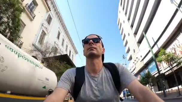 Man Black Sunglasses Jockey Hat Riding Bike Streets Athens City — Stok video