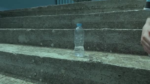 Kid Playing Plastic Bottle Water Bottle Flip Game — Wideo stockowe