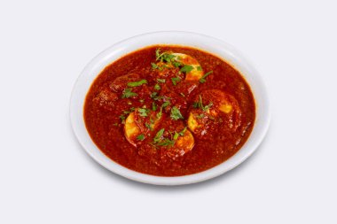 Yumurtalı masala ya da soğan, sarımsak ve Hint baharatlarının karışımıyla hazırlanmış körili yumurta..