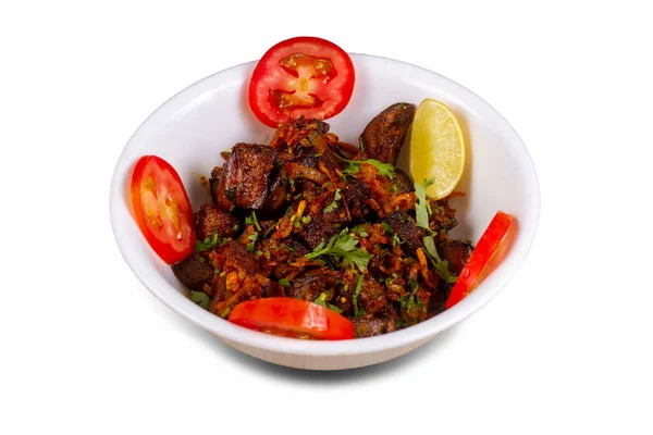 Chicken Liver Masala or Kaleji fry garnished with coriander. Liver fry is a very popular Nonvegetarian Indian dish. Made from the Chicken liver. White background. copy space with spices.