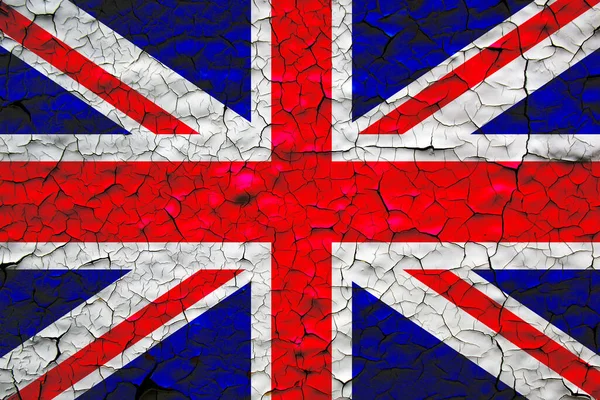 United Kingdom flag painted over cracked concrete wall. economic crisis in United Kingdom concept.