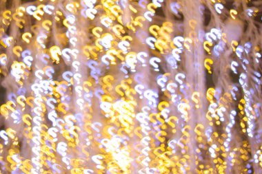 Yeni yılı kutlamak için Noel ışıkları tarafından oluşturulan bulanık bokeh arka plan. Güzel Noel ışıkları arka planı ve arka planı her tasarım ya da Noel tebrik kartı için kullanılabilir..