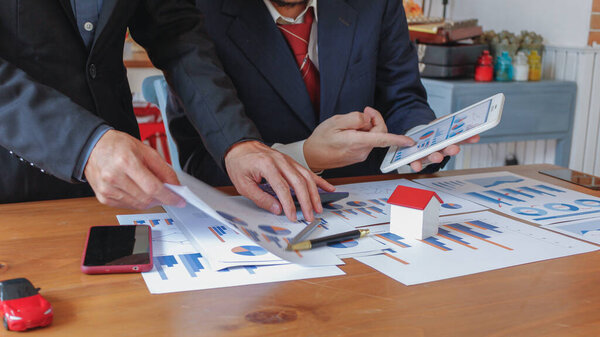 Investors are planning a real estate business and reviewing sales and statistics of real estate sales over the past year to discuss and consult with the board of directors before starting the business.