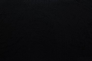 siyah sahte deri arka plan kitap kapaklarını sarmak ya da günlük deri koltuk ve aletleri tamir etmek için kullanılır. Siyah sahte deri üzerinde arkaplan ve desen metin için yer var.