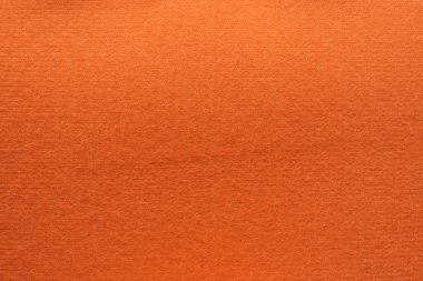 Top View 'da yere serilmiş turuncu flanel çok güzel bir keçeli kumaş arka plandır ve metin ve diğer tasarımlarda kullanım için mükemmeldir. Turuncu flanel arkaplan resminin dokusu