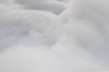 Jakuzideki beyaz baloncuklar otelin rahat misafir odalarında özel jakuzi banyosu için hazırlanan baloncuklar. Bir sürü küçük kabarcık arkaplanı ve metin eklemek için Boşluğu Kopyala.