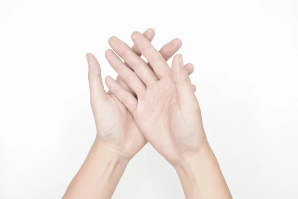 Pale palmar surface of both hands. Anaemic hands of Asian, Chinese man. Isolated on white background.