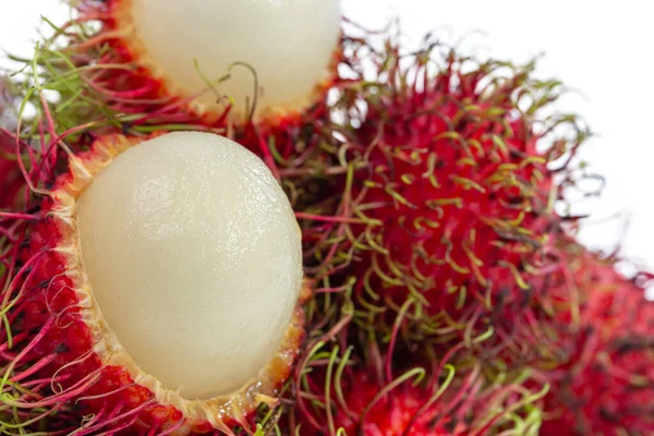 close up fresh rambutan with peel and white flesh and a naturally sweet taste