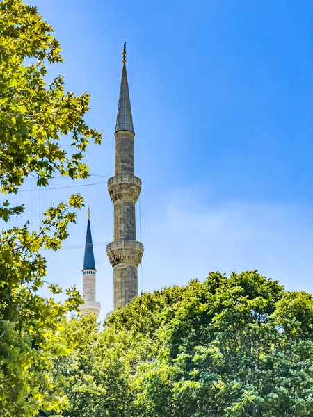 Partial View Two Islamic Architecture Designed Mosque Minarets Green Trees — Stockfoto