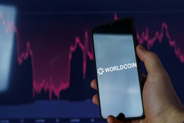 Dünya para kriptosu. Worldcoin, dünyadaki her insana bir parça vererek piyasaya sürülen dijital para birimidir..