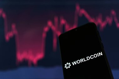 Dünya para kriptosu. Worldcoin, dünyadaki her insana bir parça vererek piyasaya sürülen dijital para birimidir..
