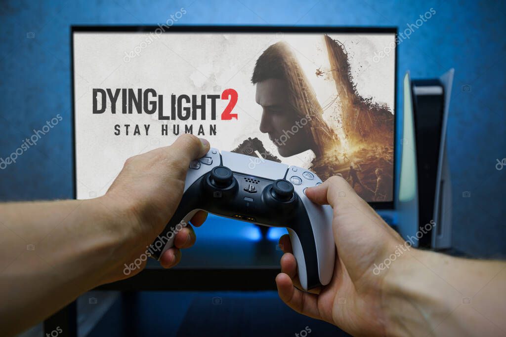 Dying Light 2 Stay Human video game. Point of view angle of playing video game with Playstation 5 console.
