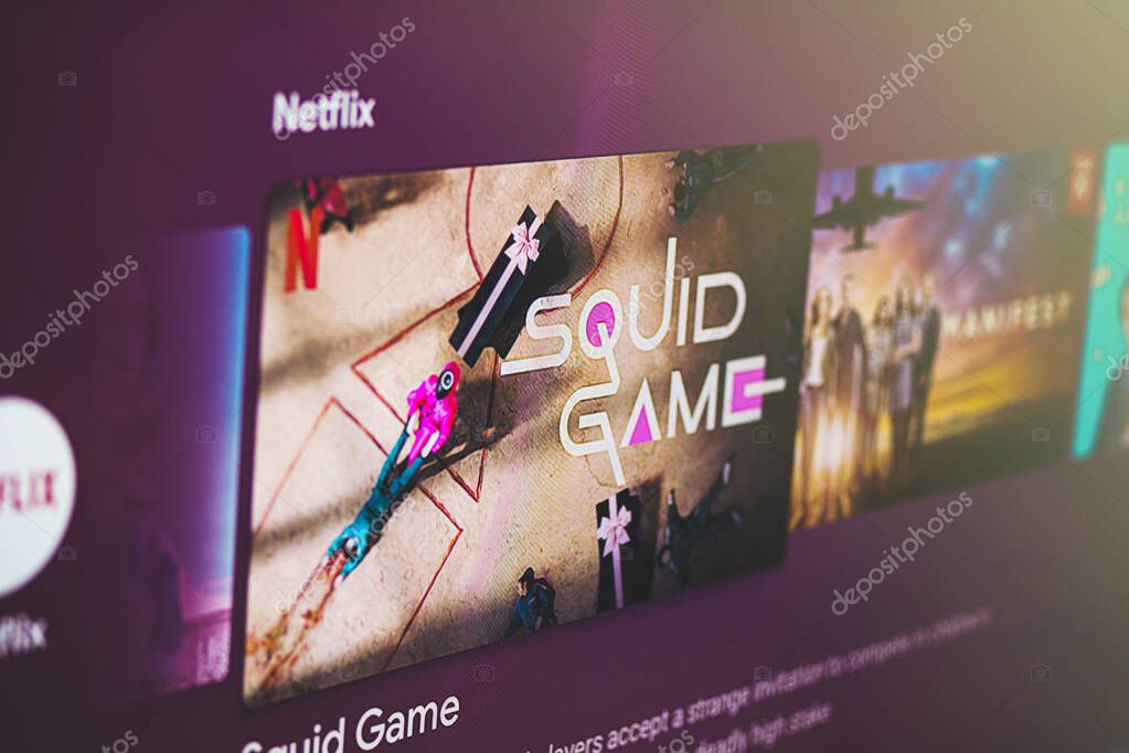 Squid game season 2 on TV screen. Most popular netflix tv show ever. Squid game is a South Korean survival drama television series streaming on Netflix