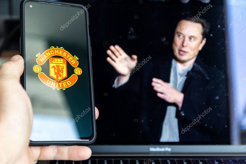 Manchester , United Kingdom - August 17, 2022: Manchester United football club and Elon Musk in background. High quality photo