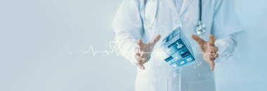 Doktor ağda sağlık ikonlarıyla birlikte sanal küp tıbbı bulunduruyor. Virüs salgını, insanların sağlık hizmetleri ve tıbbi teknoloji ağı ile ilgili bilincini artırarak hasta sağlık hizmetlerinde refahı sağlar..