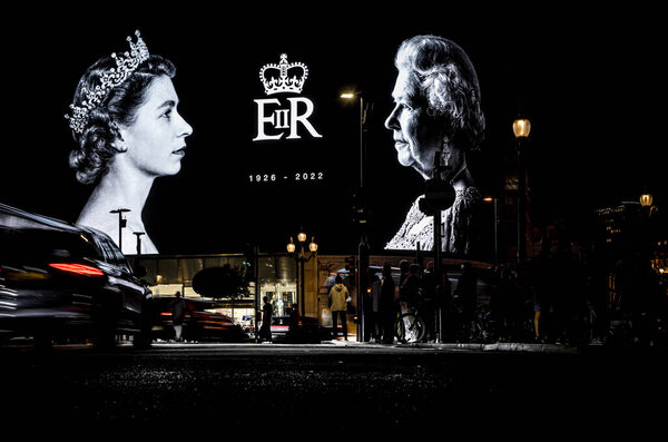 Her Majesty the Queen on Picadilly circus just after the announcement of her death, London