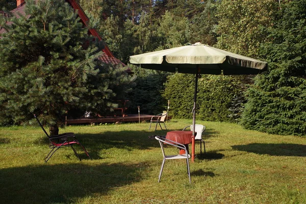 Lawn Furniture Umbrella Summer 스톡 사진