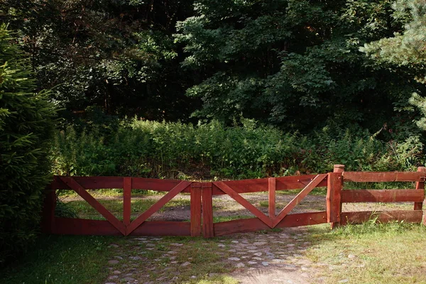 Wooden gate in the country yard