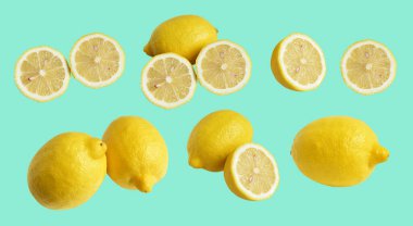 Kesme yolu ile izole edilmiş taze sarı limon meyvesi, gölge yok, parçalar, yarısı, yeşil arka planda dilimler