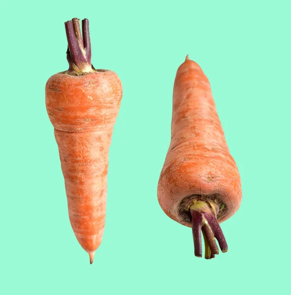 Fresh raw carrot isolated with clipping path, no shadow in white background