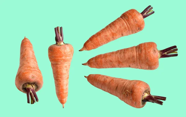 Fresh raw carrot isolated with clipping path, no shadow in white background