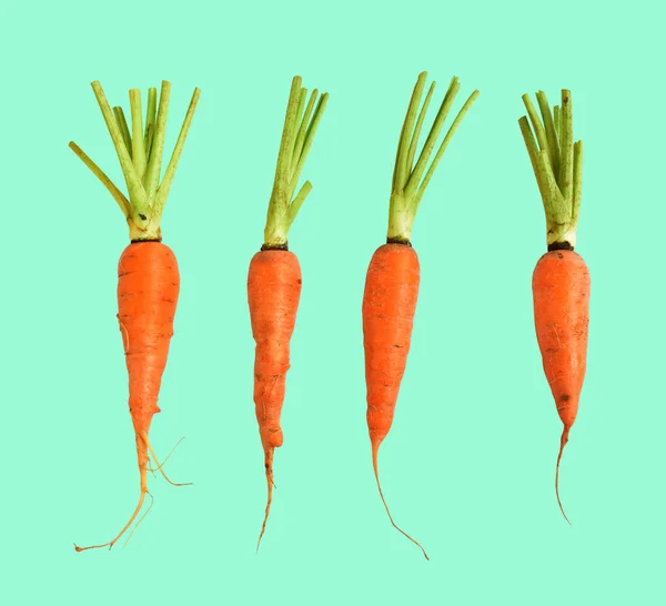 Fresh raw carrot isolated with clipping path, no shadow in white background