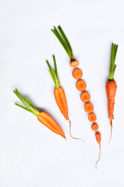 Carrots isolated in white background, food ingredients, carrot background, top view, flat lay, frame