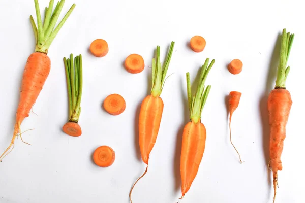 Carrots isolated in white background, food ingredients, carrot background, top view, flat lay, frame