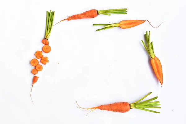 Carrots isolated in white background, food ingredients, carrot background, top view, flat lay, frame