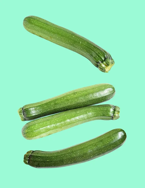 Fresh green zucchini or courgette vegetables isolated with clipping path, no shadow in white back ground