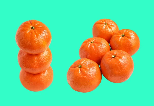 Mandarin orange isolated with clipping path in green background, no shadow, healthy fruit