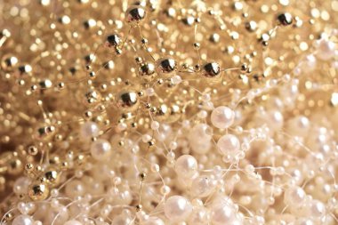 Işıltılı pırıltılı pırıltılı altın inci tel, takı el yapımı arka plan