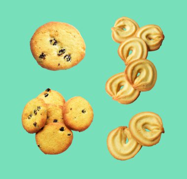 İzole edilmiş bisküviler, tatlı krakerler, kırpma yolu olan kurabiyeler, yeşil arka planda gölge yok.