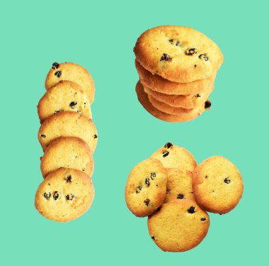 İzole edilmiş bisküviler, tatlı krakerler, kırpma yolu olan kurabiyeler, yeşil arka planda gölge yok.