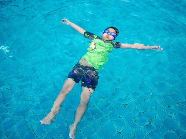 Boy Wearing Swimsuit Glasses Swimming Middle Pool Blue Water Background — Fotografia de Stock