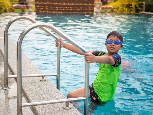 Boy Wearing Swimming Goggles Blue Pool Ladder Green Swimsuit —  Fotos de Stock