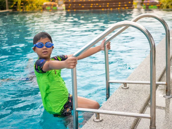 Boy Wearing Swimming Goggles Blue Pool Ladder Green Swimsuit —  Fotos de Stock