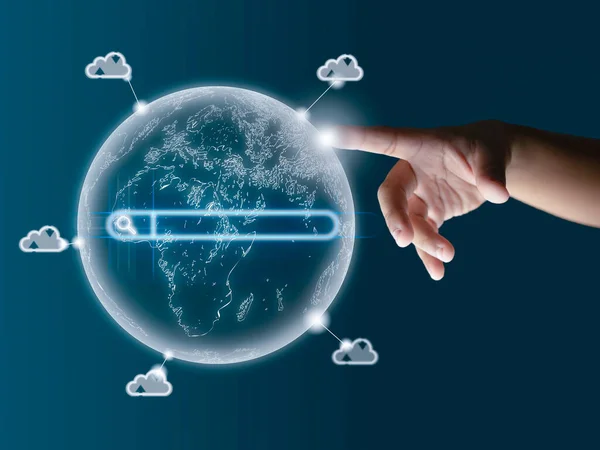 The human finger points to the world model. Displays data transfers around the world. The global cloud system, the global Internet system, communication.