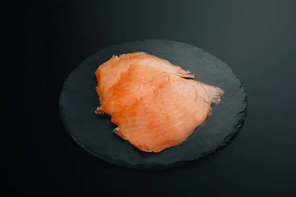 Smoked Salmon Slices Black Stone Background — Stockfoto